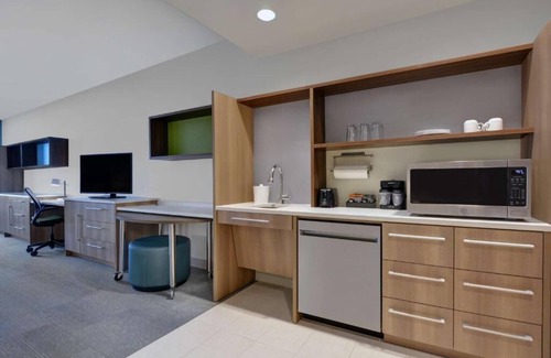 Upper Grand Lagoon Hotel | Your Home Away From Home! Onsite Pool, Kitchen, Free Breakfast, Parking!