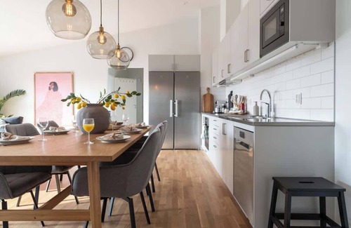 Bastad Condominio | Youthful 3BR Flat w Balcony and Hobby Game Board