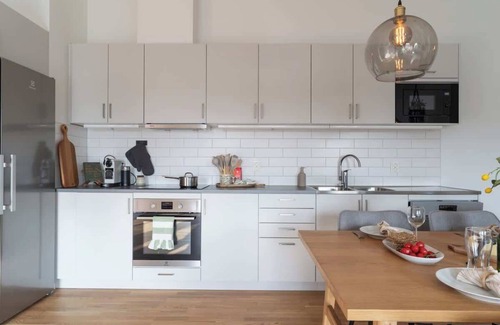 Bastad Condominio | Youthful 3BR Flat w Balcony and Hobby Game Board