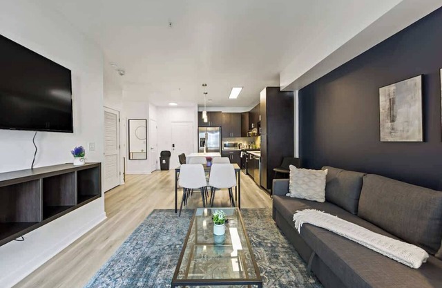 Stylish 1BR Retreat | 5 Mins to Downtown | Gym + Parking + W/D