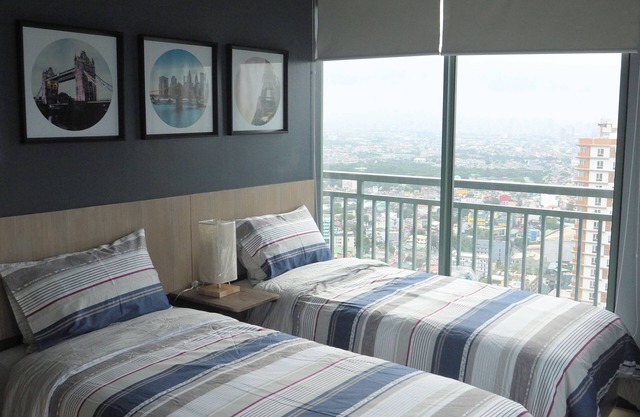 Amplia suite ejecutiva en esquina de 2 dormitorios, con impresionantes vistas, cerca de Shangri-La