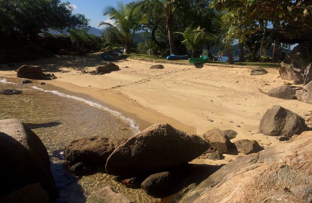Casa de 4 dormitorios con playa privada y un hermoso jardín en la Isla Grande