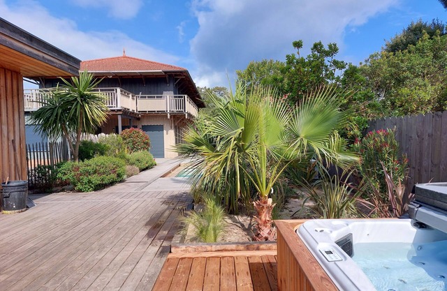 Casa de madera catalogada 4 * piscina climatizada, cerca de la playa del océano, capacidad para 10 a 14