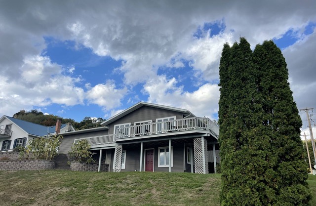 A fully modeled home overlooking Mississippi River in a charming river town.