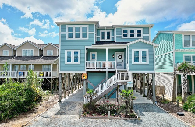 "A Perfect Landing" is a 6 Bedroom / 6.5 Bath Home w/ Private Pool & Elevator.