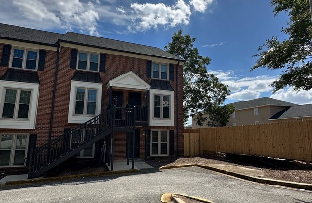 A quick 1/2 block from campus perfect location WALK to Football Games