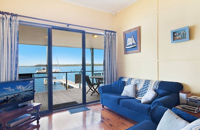 Frente de agua absoluta con embarcadero privado !! Sunshine Cottage en el lago Macquarie