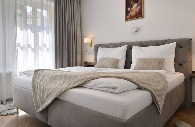 Welcome to Kaiserstein Palace Apartments -Luxury Living in the Heart of Prague.