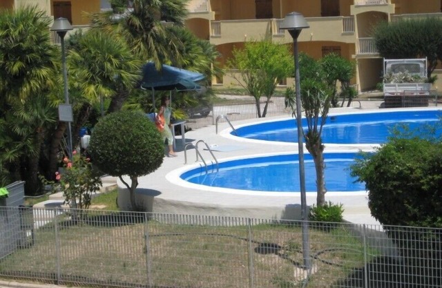 Alghero Lido frente a la playa casa con piscina