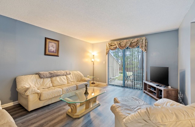 All-suite Bay Tree retreat with al fresco dining, water views, and shared pool