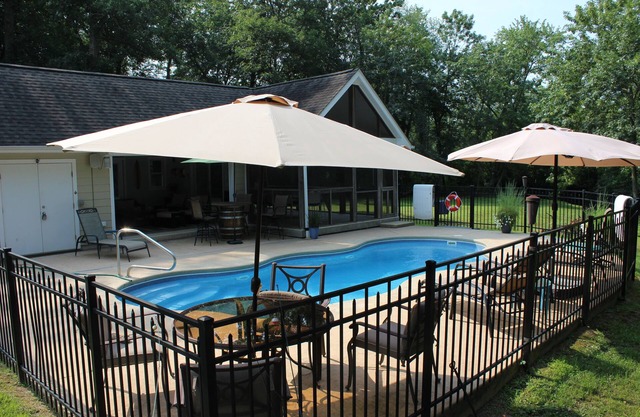 AMAZING Coastal Retreat along Love Creek w/ private pool, hot tub and pool house