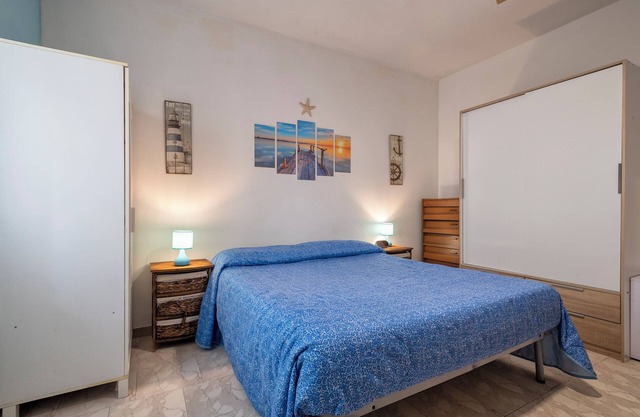 Apartamento 'Alghero Lido A 100mt Dalla Spiaggia' con vistas al mar, balcón y Wi-Fi