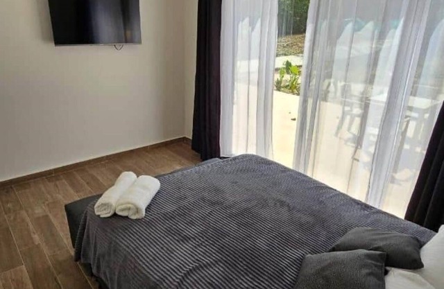 Apartamento 3 con balcón y vistas al jardín tropical