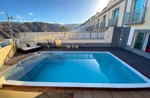 Apartamento "Happy Dreamer" con piscina grande, vistas a la montaña y Wi-Fi