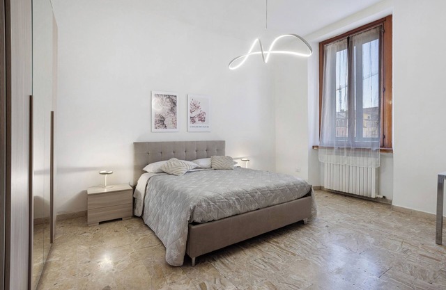 Apartamento 'Home Milano' con jardín compartido, Wi-Fi y aire acondicionado