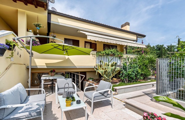 Apartamento "Il Giardino Degli Agrumi" con jardín privado