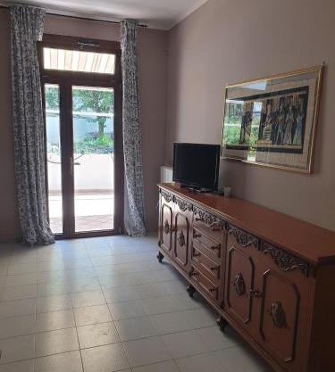 Apartment in villa with pool