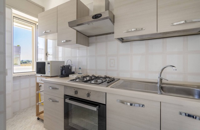 Apartamento 'Mariantonietta Home' con balcón, Wi-Fi y aire acondicionado