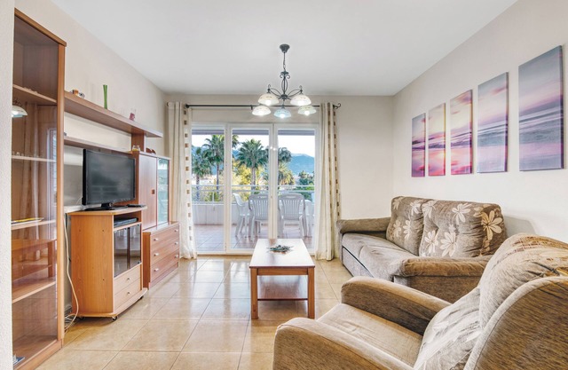 Apartamento "Puerto Romano" con vistas a la montaña, piscina compartida y Wi-Fi