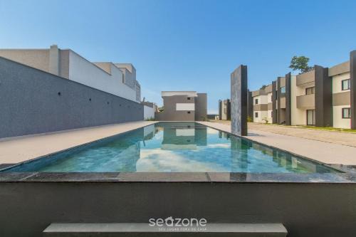 Apartamentos con piscina a 700m de la playa de Taperapuan NVM0009
