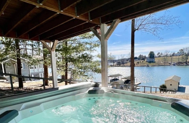 Barefoot Retreat, Private Lakefront w/ Covered Porches + Beach, Docks, Hot Tub & Fire Pit!