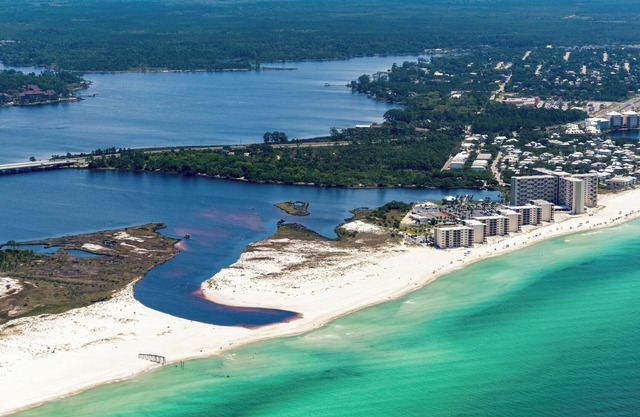 Beachfront Charm Meets Lake Life + Free Tickets: Dolphin Cruise & More!