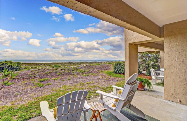 Beachfront condo with outdoor pool, patio & washer/dryer - dog-friendly