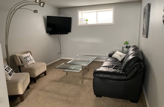 BEAUTIFUL 2 Bedroom Suite Close To The Airport minutes from downtown/ hospital.
