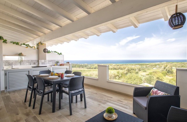 Bonito apartamento para 4 personas con WIFI, A/C, TV, terraza, vista panorámica y aparcamiento