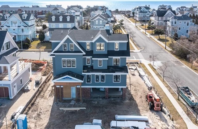 Beautiful BRAND NEW home with Ocean views, an in-ground pool, and an elevator.