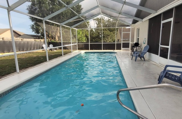 Beautiful Home with 36' Screened Pool, Fenced Yard & Cozy Fire Pit!