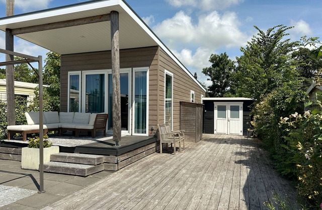 Beautiful modern chalet with a large terrace under an awesome awning