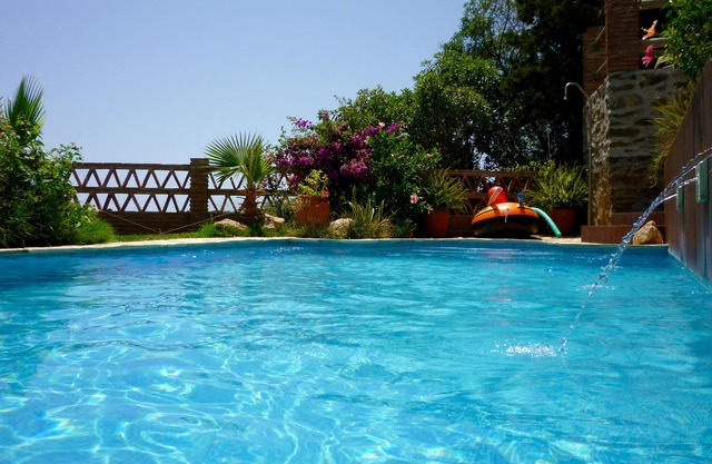 Hermosa villa, piscina propia 400 metros playa TV Esp WiFi Vistas mar Aire-acon