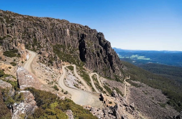 Cosy cabin in historic alpine village, surrounded by Tassie wilderness & iconic road.