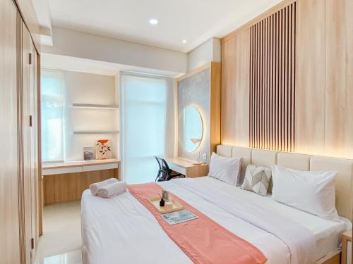 Big and Comfy Studio at Vasanta Innopark Apartment By Travelio