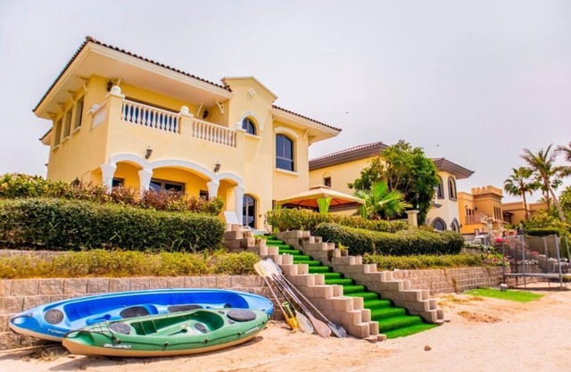 brand new luxury villa with a private beach in your backyard.