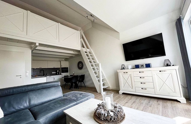 Bright, comfortably furnished apartment directly on the dike and beach!