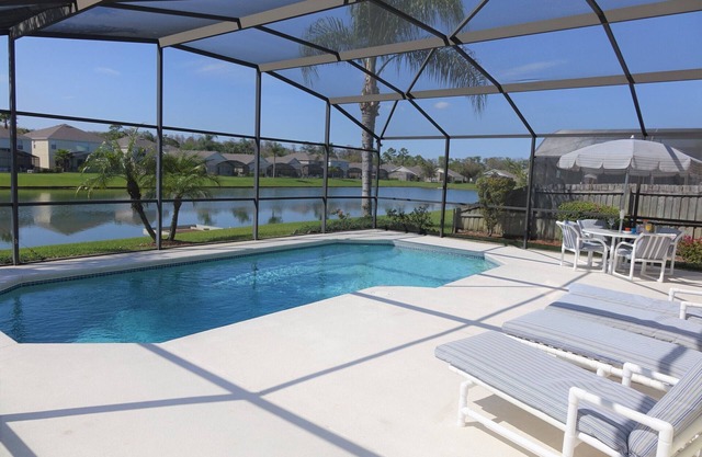 BrightwaterVilla. Lake view, west facing extra large pool deck, lanai, hot tub