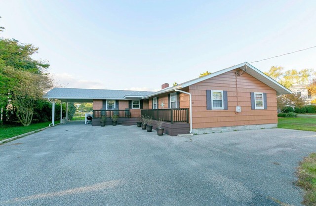 Canal-Front Retreat: 5BR Home w/ Private Dock, Porch, Beach & Pool Access!