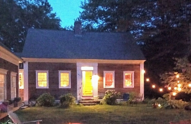 Cape on wildlife sanctuary, with lake, ski resort, and college town close by.