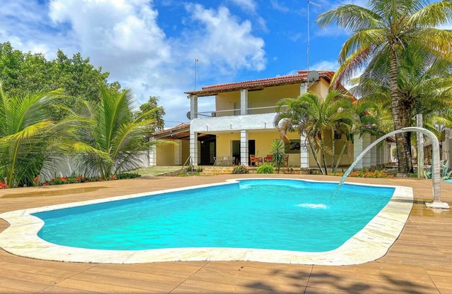 Casa com piscina em Itacimirim/BA