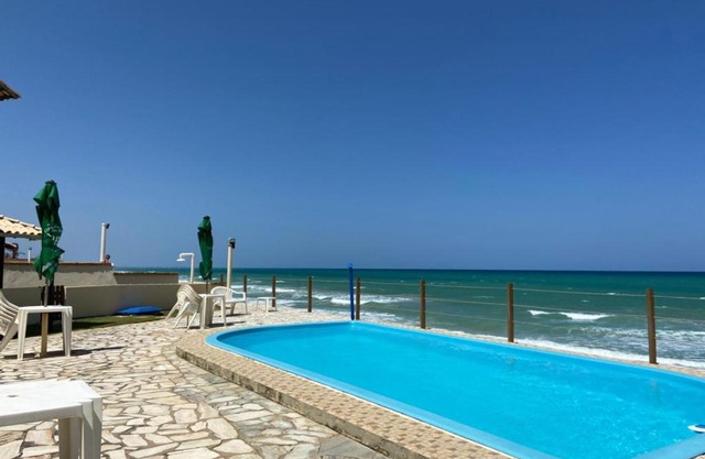 Casa de praia em condomínio à beira mar