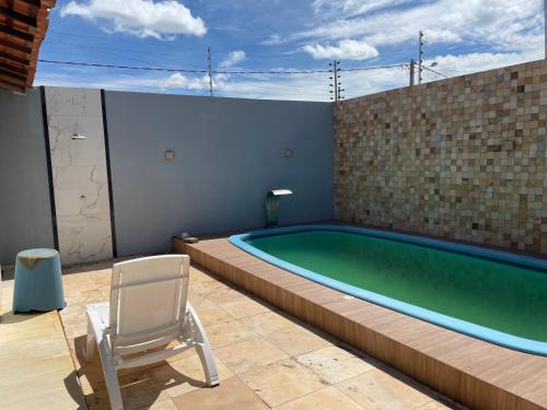 Casa por temporada com piscina