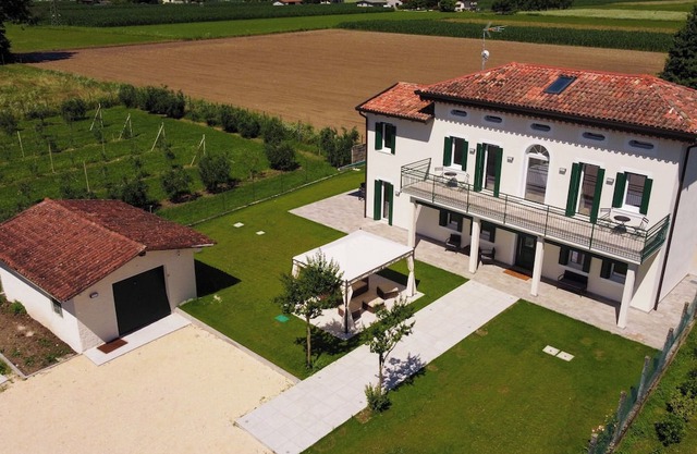 Casa Titti Polcenigo entire housing with a view of Friulian hills.
