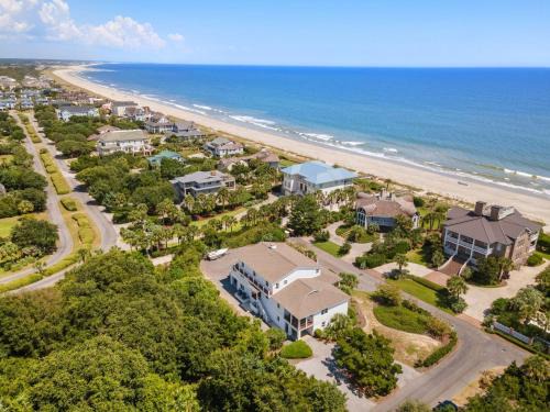 Celebrate the beauty of the beach in this luxurious second row home home