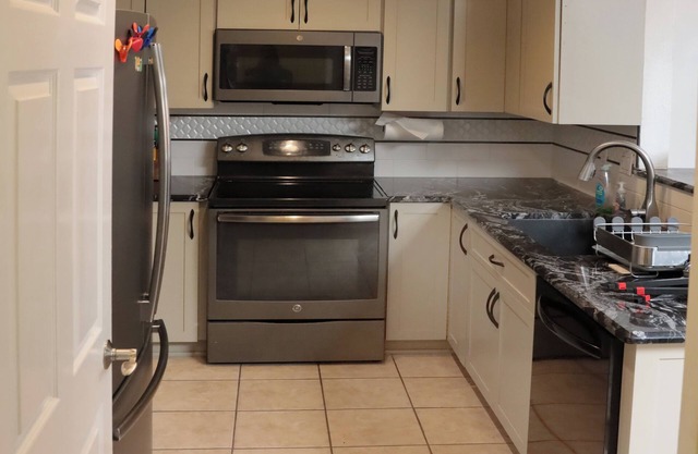 Centrally located comfortable North Valley home, an art filled oasis in the city
