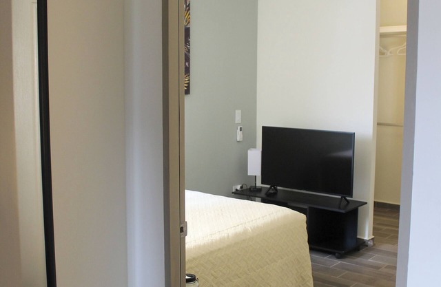 Charming 2-bedroom apartment in Santa Tecla w/ kids zone & gym.