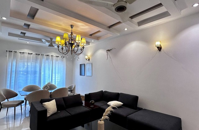 Charming 3-bedroom house with AC, WiFi in lively DHA Lahore