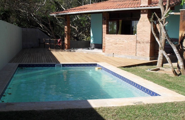 Encantadora casa de playa, porche con gran terraza, piscina y barbacoa.