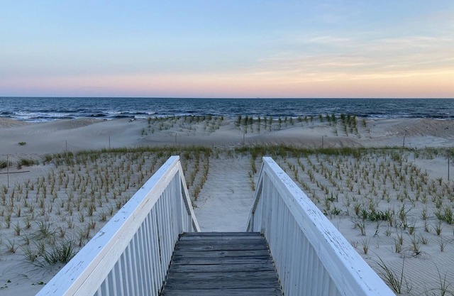 Charming Beachfront Cottage Awaits You! Direct access to beach off deck/walkway.